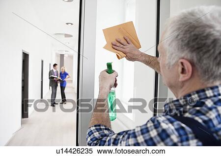 Man cleaning window View Large Photo Image Stock Photography - Man cleaning window. Fotosearch