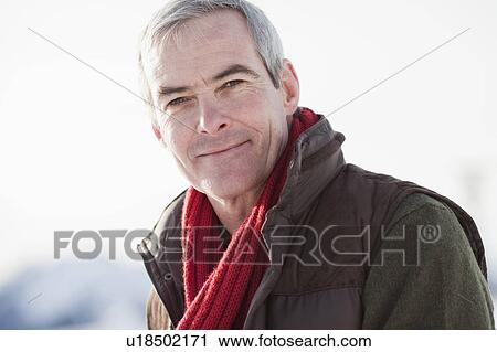 Stock Image - Man contentedly smiling. Fotosearch
