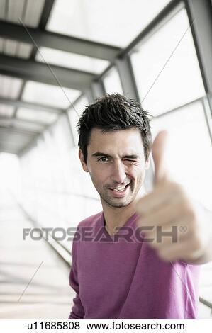 Man giving thumb up View Large Photo Image Stock Photo - Man giving thumb up. Fotosearch