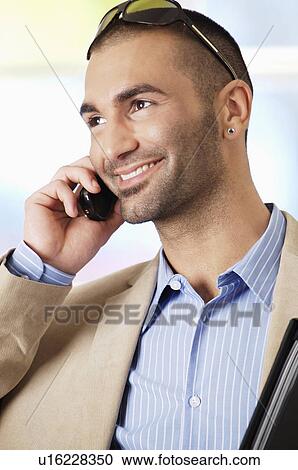 man having a phone call View Large Photo Image Stock Image - man having a phone call. Fotosearch