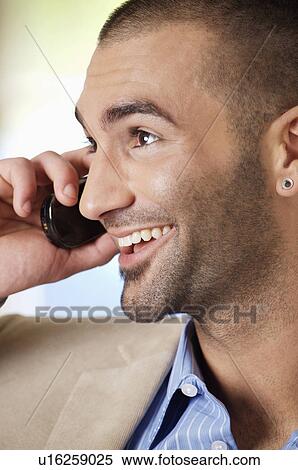 Stock Photography - man having a phone call. Fotosearch