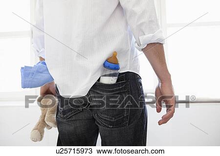 Man having baby-things in his pockets View Large Photo Image Stock Image - Man having baby-things in his pockets. Fotosearch