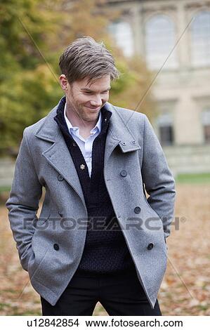 Man in autumn city atmosphere View Large Photo Image Picture - Man in autumn city atmosphere. Fotosearch