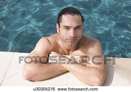 Man in pool View Large Photo Image Stock Photograph - Man in pool. Fotosearch