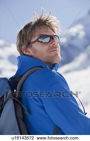 Man in sportswear in winter landscape View Large Photo Image Stock Image - Man in sportswear in winter landscape. Fotosearch