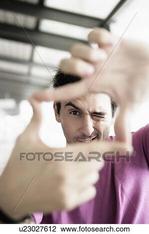 Man Looking through Finger View Large Photo Image Stock Image - Man Looking through Finger. Fotosearch