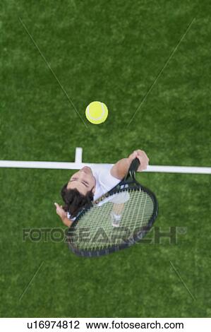 Man playing tennis View Large Photo Image Stock Image - Man playing tennis. Fotosearch