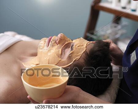 Man receiving facial View Large Photo Image Picture - Man receiving facial. Fotosearch