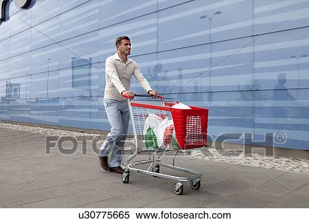 Man shopping View Large Photo Image Stock Photography - Man shopping. Fotosearch