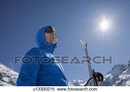Man with cross-country ski in winter View Large Photo Image Stock Photography - Man with cross-country ski in winter. Fotosearch