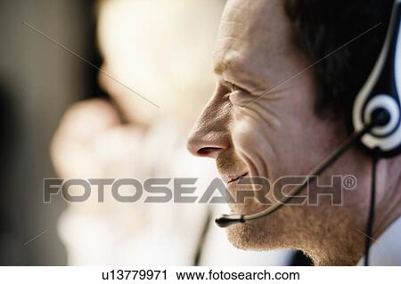 Man with headset View Large Photo Image Stock Image - Man with headset. Fotosearch