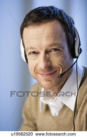Man with headset View Large Photo Image Stock Image - Man with headset. Fotosearch