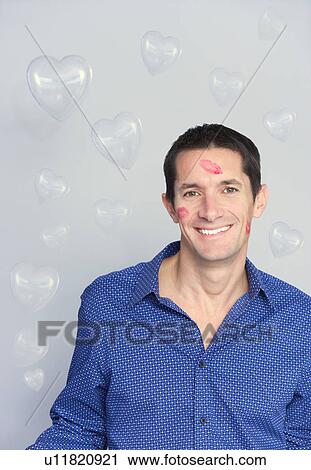 man with lipstick, hearts around him View Large Photo Image Stock Image - man with lipstick, hearts around him. Fotosearch
