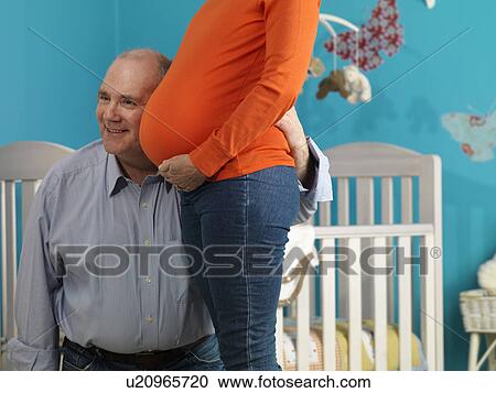 Mature man with pregnant woman View Large Photo Image Stock Image - Mature man with pregnant woman. Fotosearch