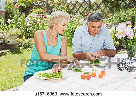 mature woman teaches partner to peel pod View Large Photo Image Stock Image - mature woman teaches partner to peel pod. Fotosearch