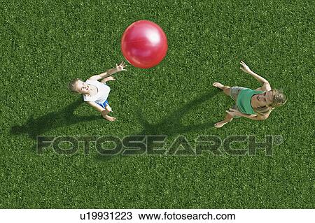 Mother and child playing ball View Large Photo Image Stock Image - Mother and child playing ball. Fotosearch