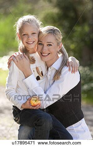 Mother and daughter enjoy time together View Large Photo Image Stock Image - Mother and daughter enjoy time together. Fotosearch