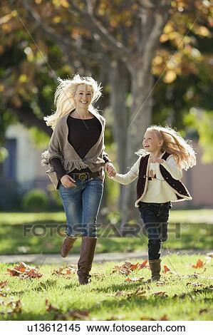 Mother and daughter enjoy time together View Large Photo Image Stock Photography - Mother and daughter enjoy time together. Fotosearch