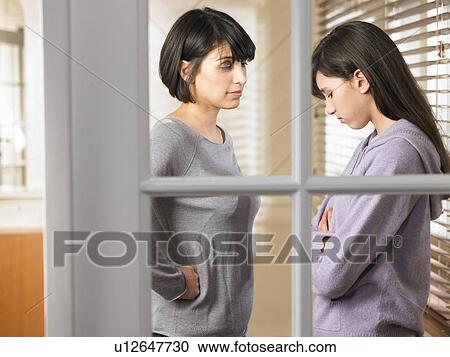 Mother and daughter having a talk View Large Photo Image Stock Image - Mother and daughter having a talk. Fotosearch
