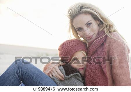 Mother and daughter on beach View Large Photo Image Stock Photograph - Mother and daughter on beach. Fotosearch