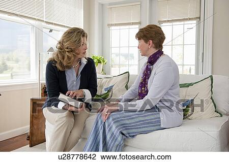 Mother and daughter talking couch View Large Photo Image Stock Image - Mother and daughter talking couch. Fotosearch