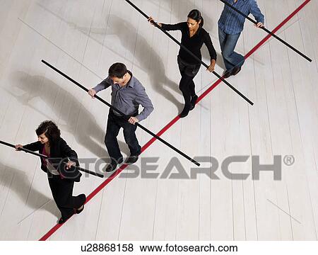 People balancing on thin red line View Large Photo Image Stock Photo - People balancing on thin red line. Fotosearch