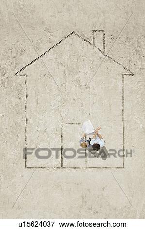 Stock Photo - Planning a house. Fotosearch