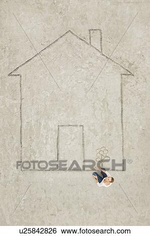 Stock Photograph - Planning a house. Fotosearch