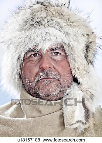 Portrait of a man wearing a fur hat View Large Photo Image Stock Photo - Portrait of a man wearing a fur hat. Fotosearch