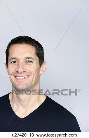 portrait of a smiling man View Large Photo Image Stock Image - portrait of a smiling man. Fotosearch