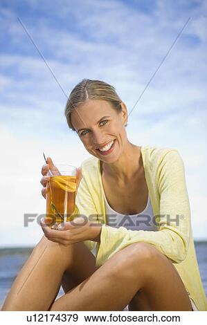 Portrait of a smiling woman View Large Photo Image Stock Photo - Portrait of a smiling woman. Fotosearch