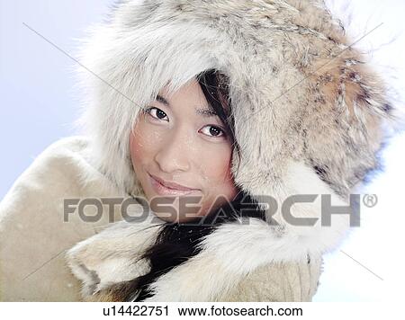 Portrait of a woman wearing a fur hat View Large Photo Image Stock Image - Portrait of a woman wearing a fur hat. Fotosearch