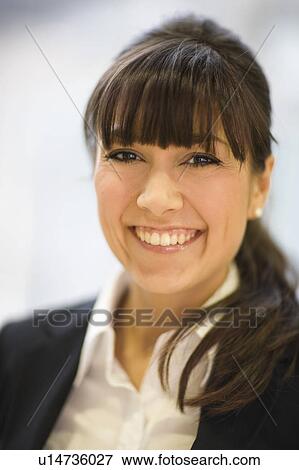 Stock Photo - Portrait of a young woman. Fotosearch