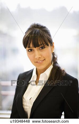 Portrait of a young woman View Large Photo Image Stock Photo - Portrait of a young woman. Fotosearch