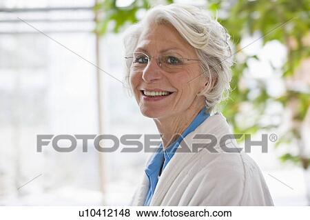 Portrait of an old woman View Large Photo Image Stock Photo - Portrait of an old woman. Fotosearch