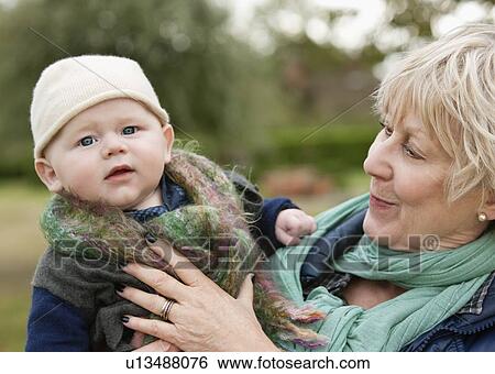 Portrait of baby with grandmother View Large Photo Image Stock Photograph - Portrait of baby with grandmother. Fotosearch