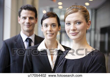 Stock Image - Portrait of business people, smiling. Fotosearch