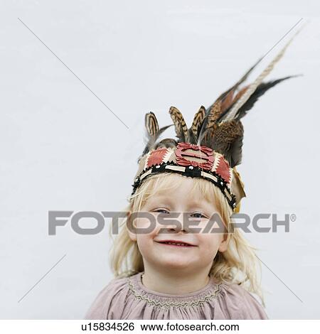 Portrait of girl smiling at camera View Large Photo Image Stock Photograph - Portrait of girl smiling at camera. Fotosearch