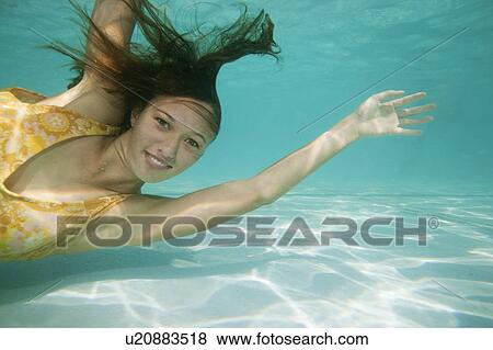 Portrait of girl underwater View Large Photo Image Stock Photo - Portrait of girl underwater. Fotosearch