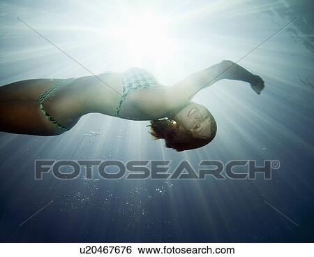 Portrait of girl underwater View Large Photo Image Stock Photograph - Portrait of girl underwater. Fotosearch