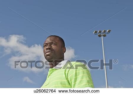 Portrait of Male in green shirt View Large Photo Image Picture - Portrait of Male in green shirt. Fotosearch