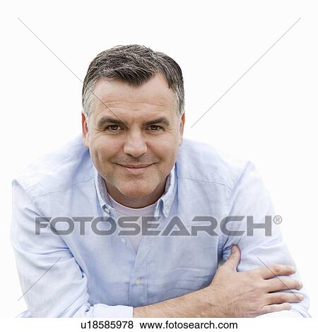 Portrait of man smiling at camera View Large Photo Image Stock Photo - Portrait of man smiling at camera. Fotosearch