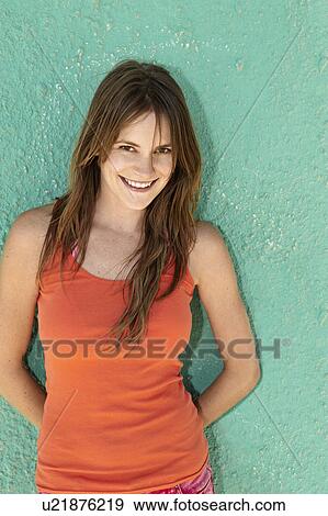 Stock Photo - Portrait of smiling young woman. Fotosearch