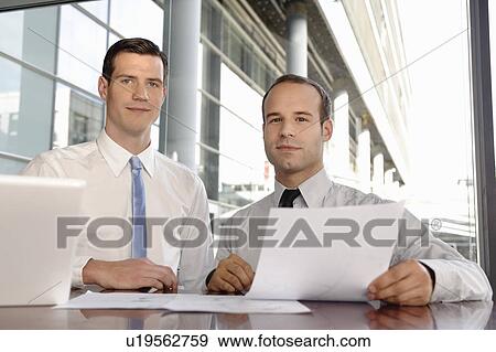 Portrait of two young businessmen View Large Photo Image Stock Photo - Portrait of two young businessmen. Fotosearch