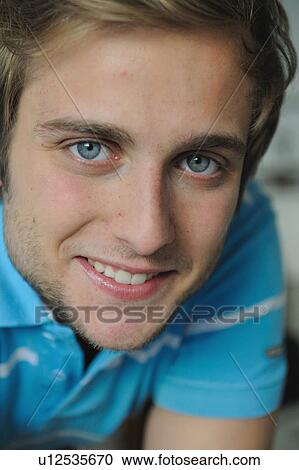 Portrait of young man smiling View Large Photo Image Stock Image - Portrait of young man smiling. Fotosearch