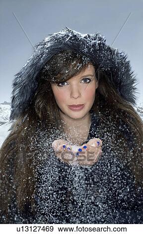 Portrait woman with snow in hands View Large Photo Image Stock Photo - Portrait woman with snow in hands. Fotosearch
