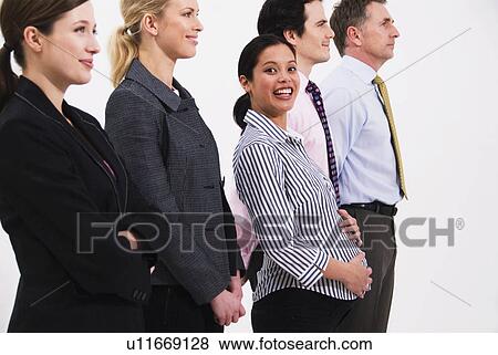 Pregnant happy women in line of people View Large Photo Image Stock Photo - Pregnant happy women in line of people. Fotosearch