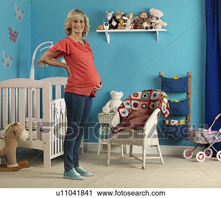 Pregnant senior woman View Large Photo Image Stock Image - Pregnant senior woman. Fotosearch