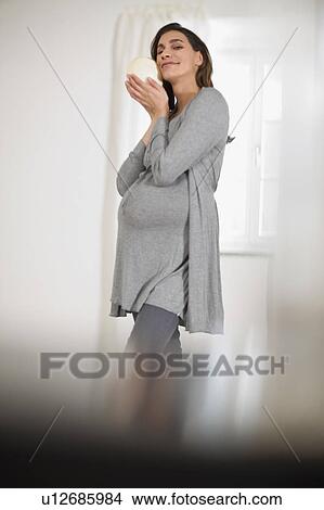Picture - Pregnant woman. Fotosearch