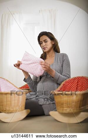 Stock Image - Pregnant woman. Fotosearch